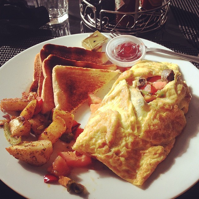My first meal back in the states and my omelet is 4x as big as it was in Jamaica. And we wonder why we are so fat!!